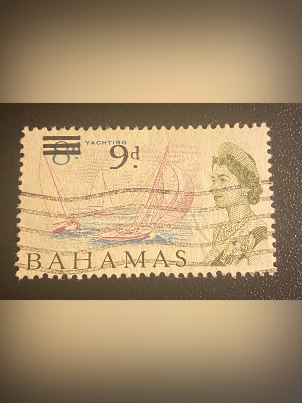 1965 Bahamas 9d "Yachting" postage stamp featuring Queen Elizabeth II.